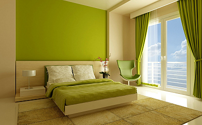 Темно зеленая кровать в интерьере спальни